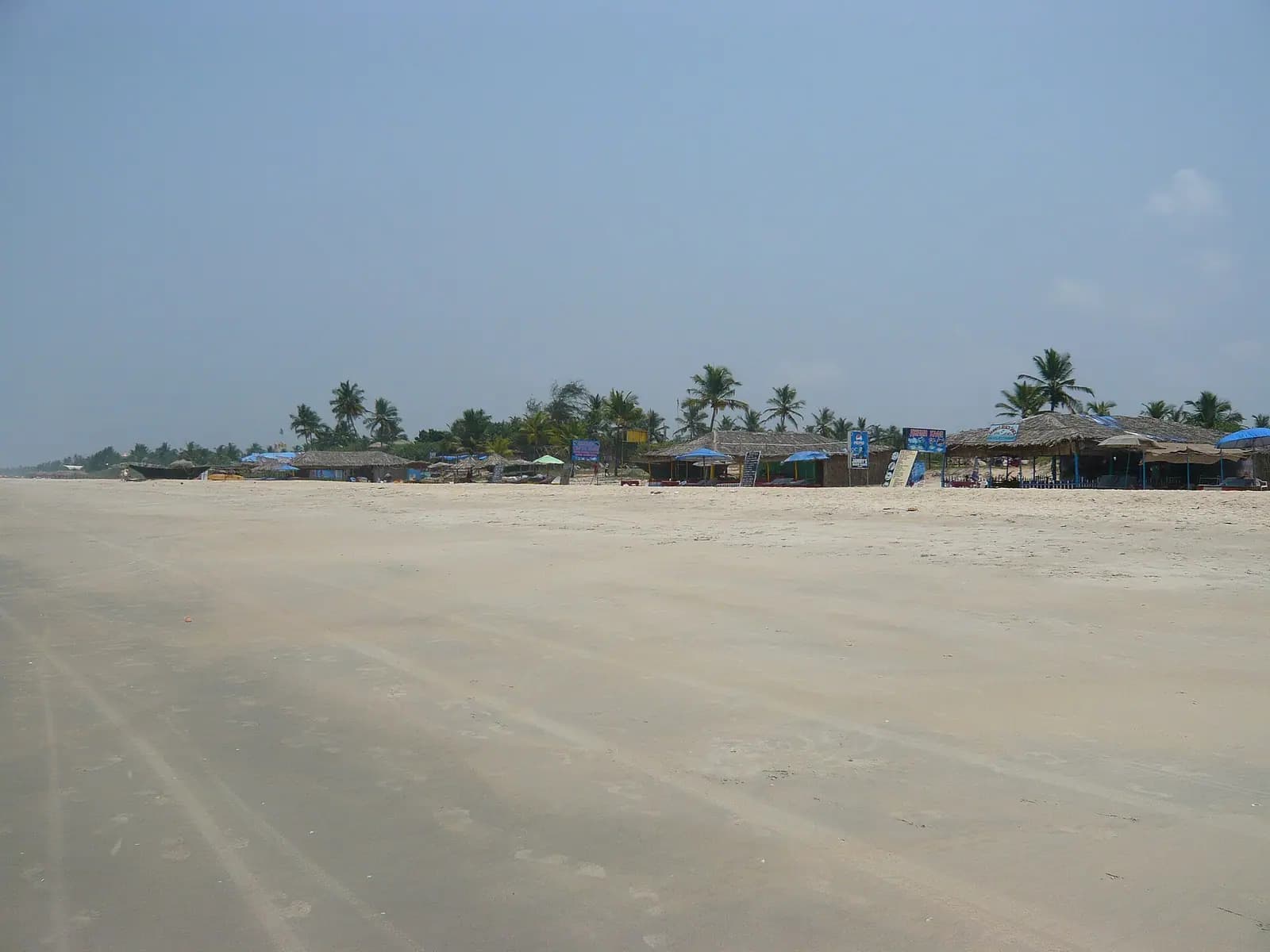 A wide, gently shelving beach in Goa, popular with families