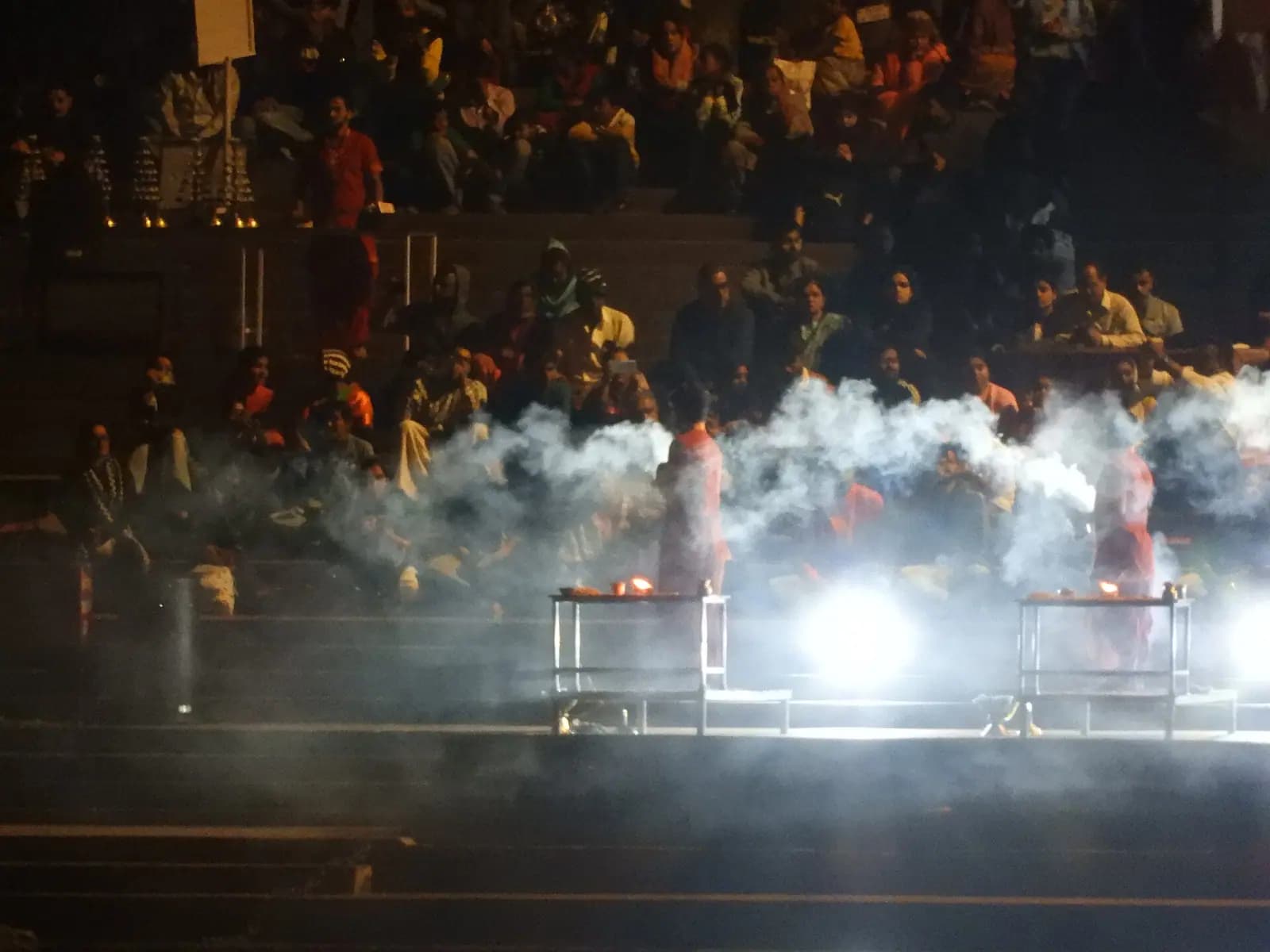 Pilgrims at the evening Ganga Aarti on Shatrugna Ghat, Rishikesh, Uttarakhand