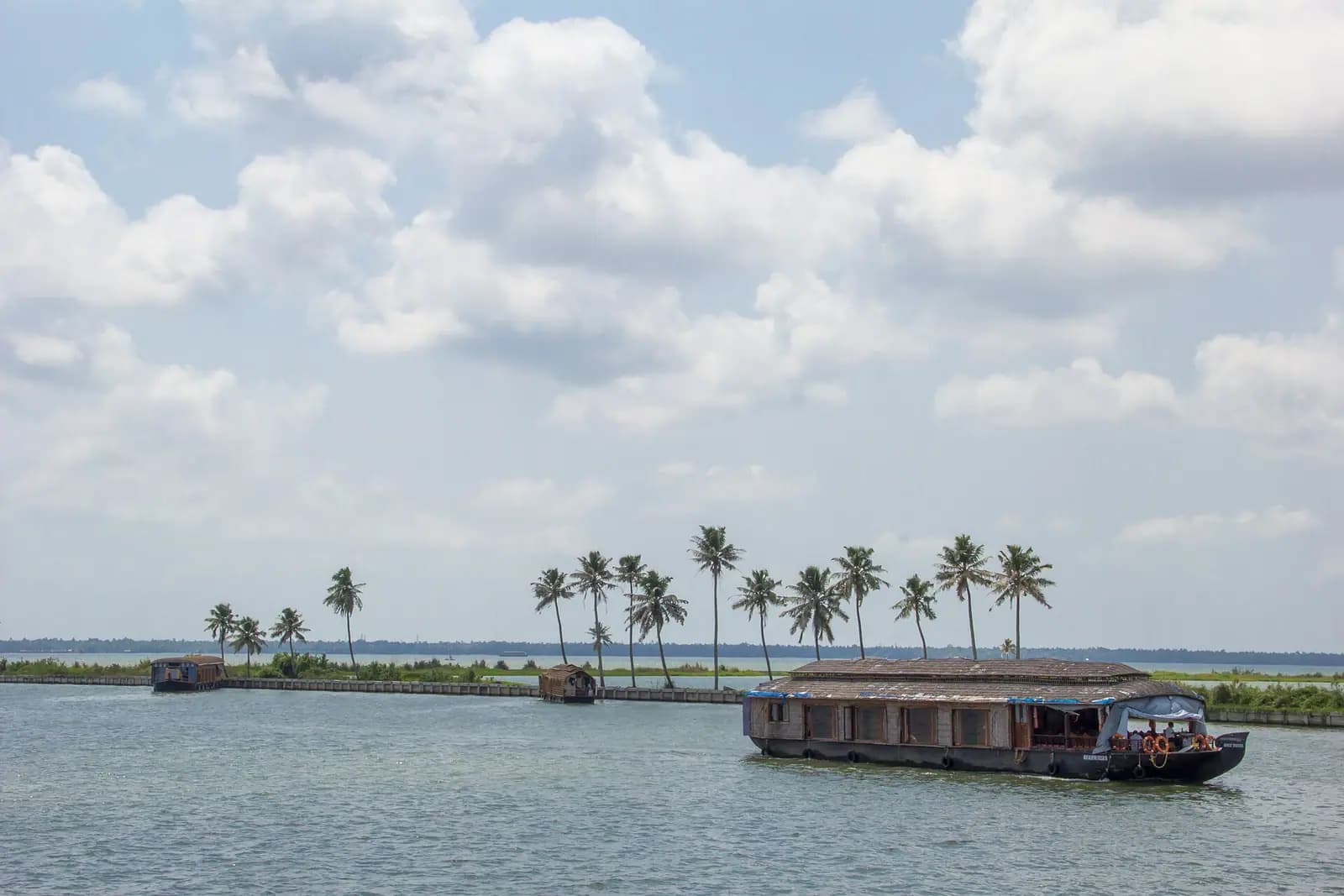 A thatched kettuvallam houseboat on the Alappuzha backwaters in Kerala