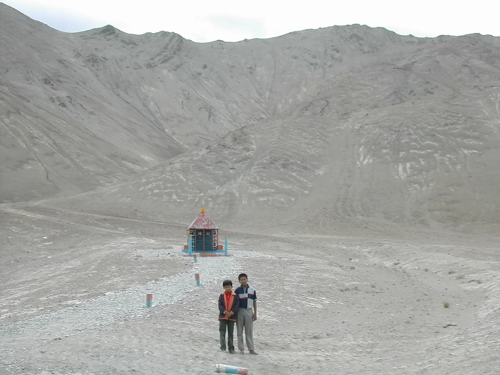 The empty highway running through barren hills near Magnetic Hill in Ladakh