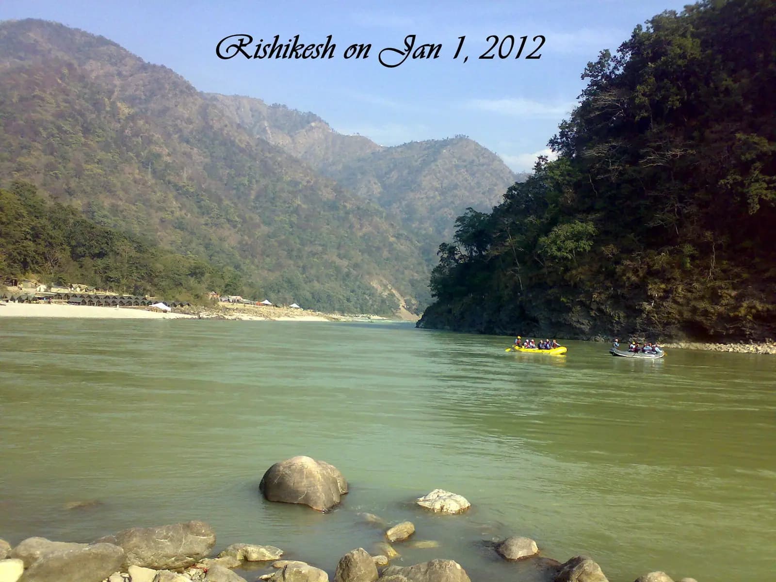 The green Ganges emerging from the Himalayan foothills at Rishikesh, Uttarakhand