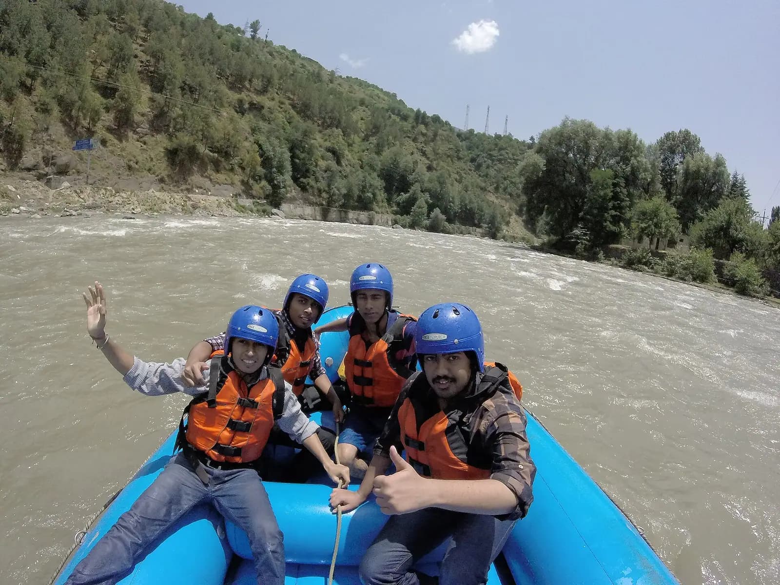 A raft running whitewater on the Beas river in the Kullu valley, Himachal Pradesh