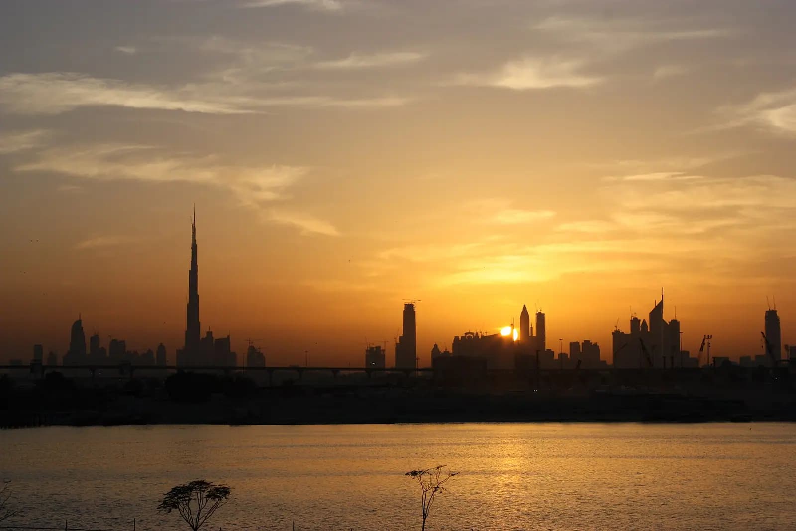 The towers of Dubai seen across the water, United Arab Emirates