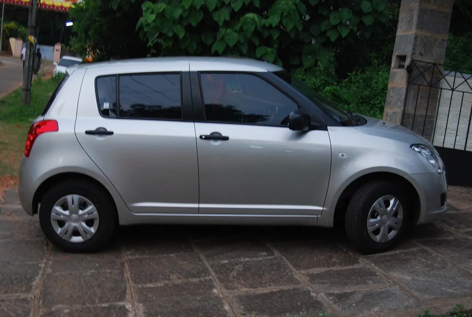 A Maruti Suzuki Swift, a common hatchback for city transfers in India