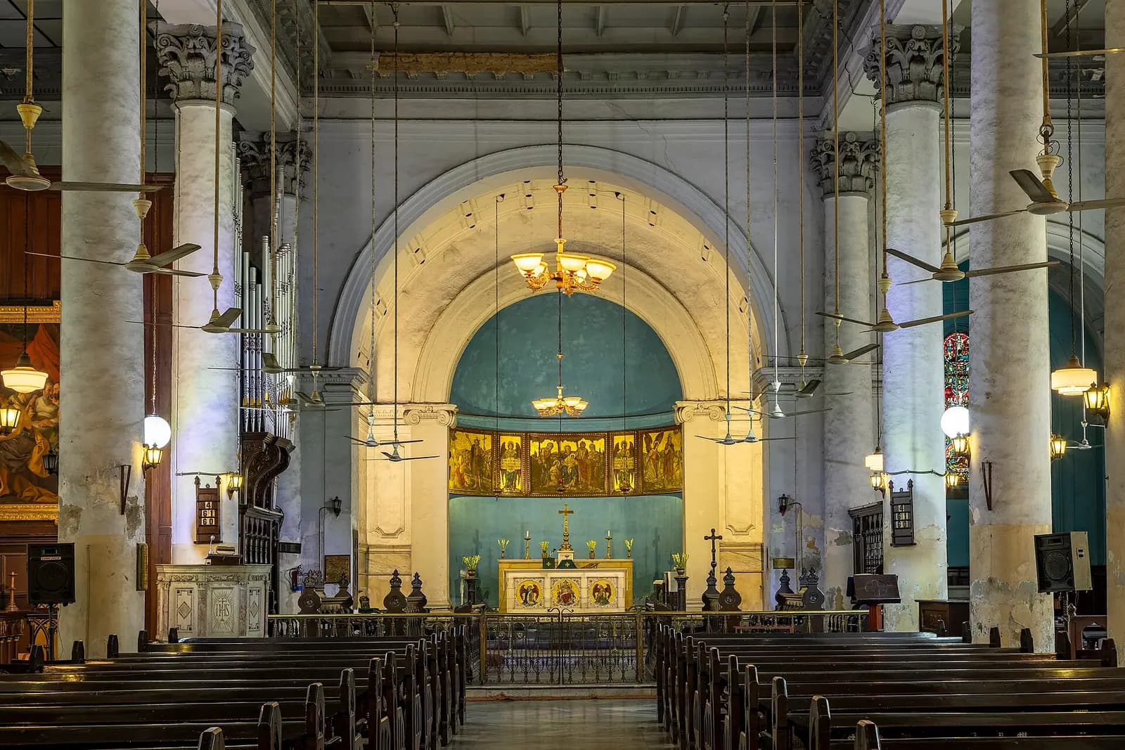 The stone facade of St John's Church among conifers in Dalhousie, Himachal Pradesh