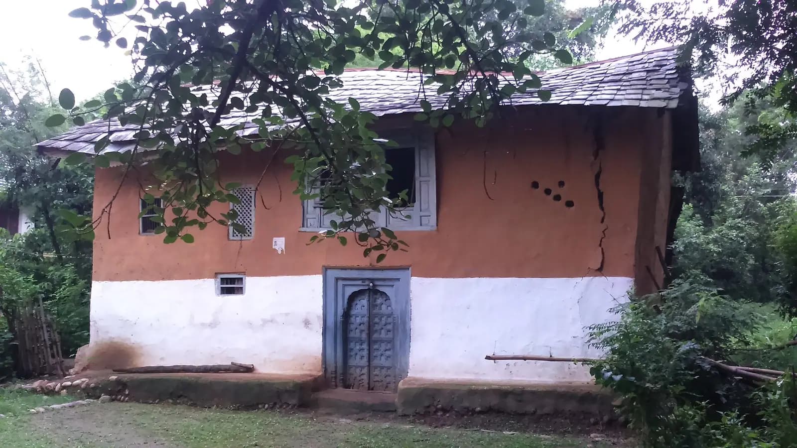 Traditional slate-and-timber houses in a Himachal Pradesh village