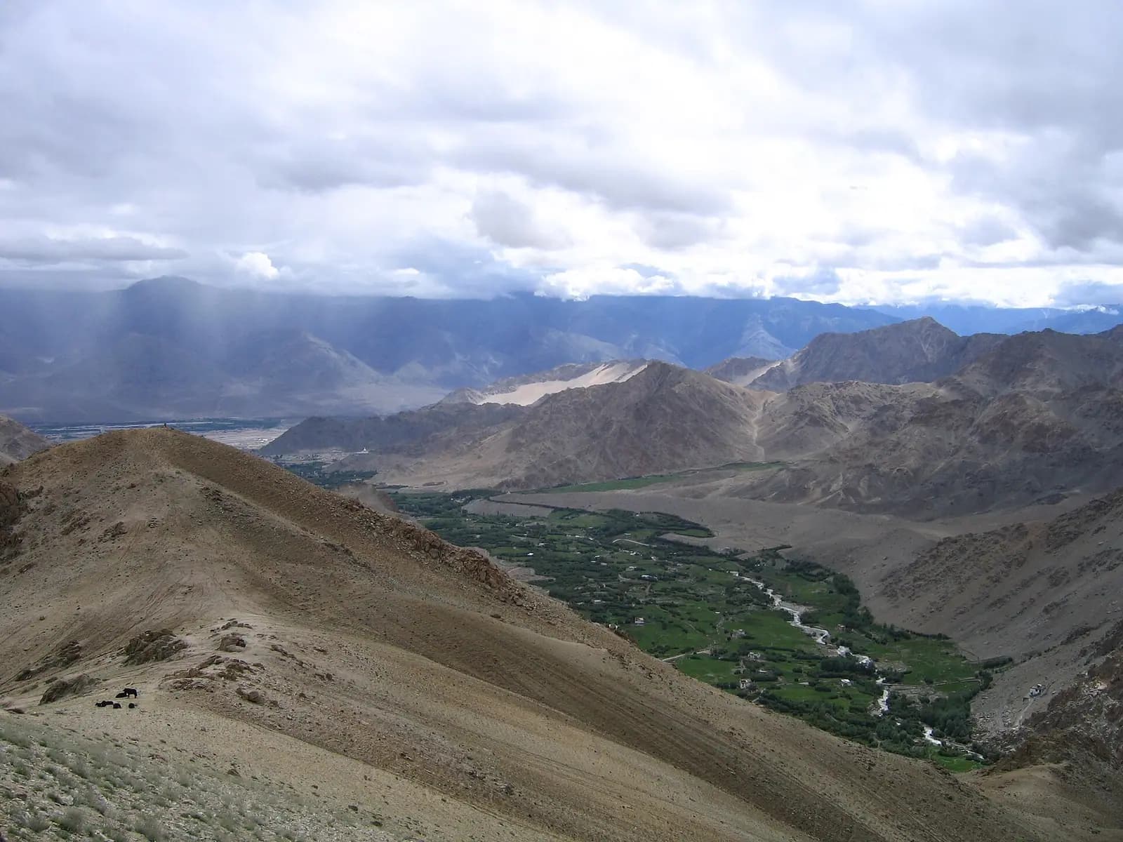 The Indus river crossing the bare high-altitude landscape near Leh, Ladakh