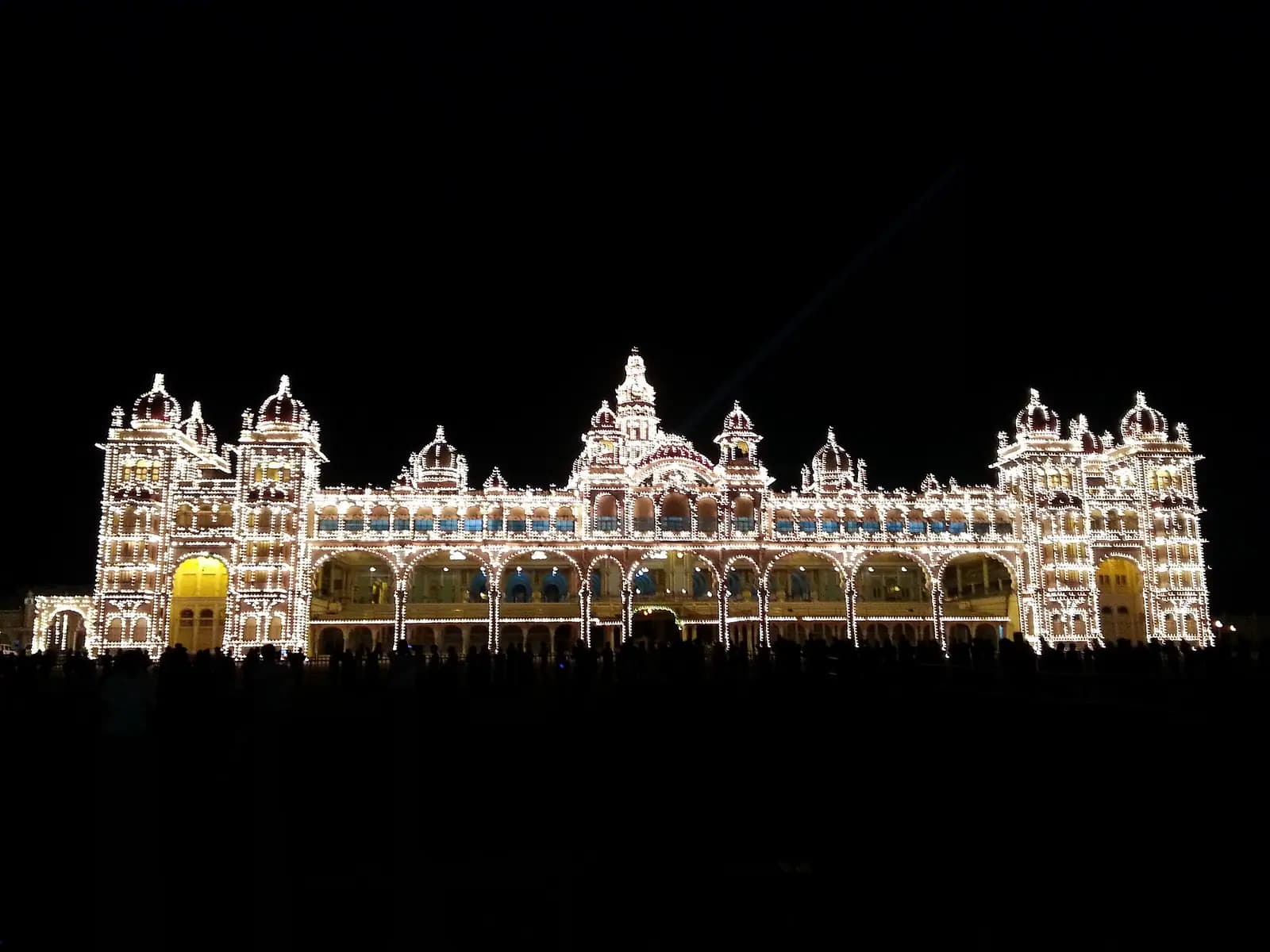 Mysore Palace outlined in lights after dark, Karnataka