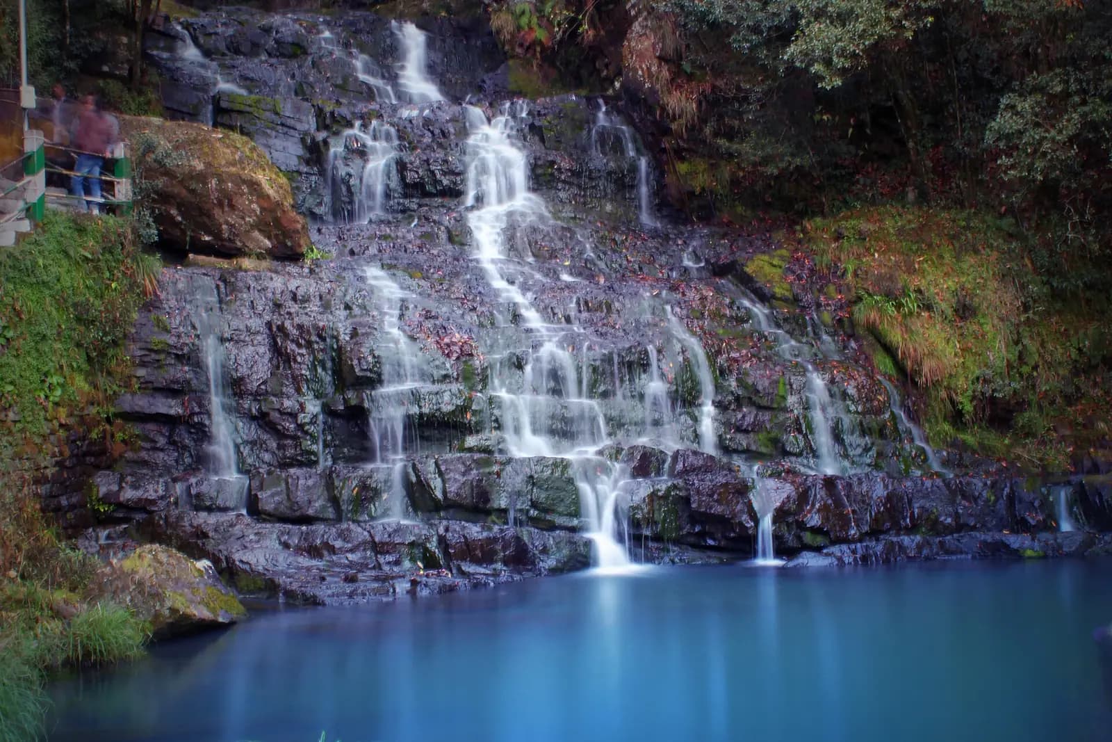 Elephant Falls stepping down mossy rock near Shillong, Meghalaya