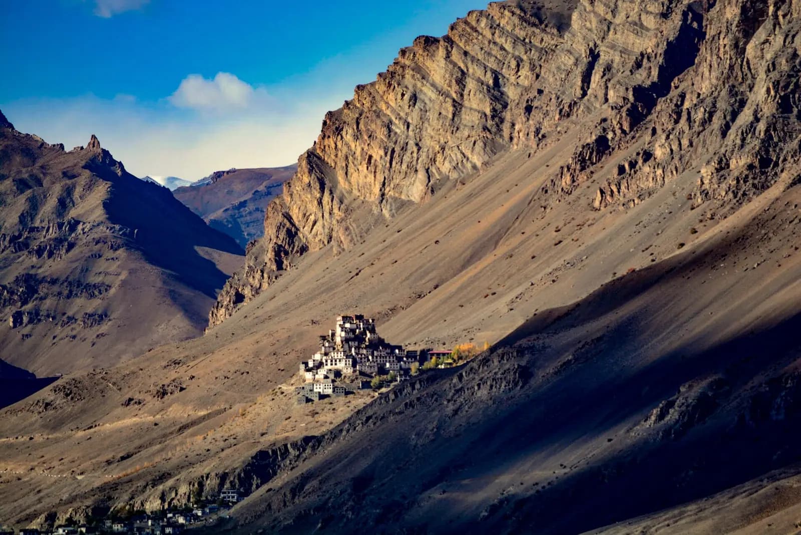 Key Monastery stacked in white tiers on its hilltop above the Spiti valley, Himachal Pradesh